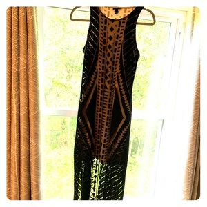 Beautiful full length dress with peek-a-boo bottom